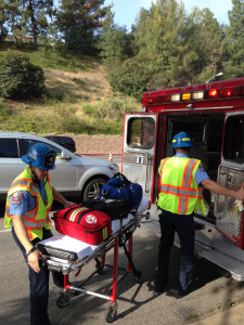 Glendale Fire paramedics arrive at GCC to stand by while the LA Sheriff Bomb Squad checks out the package in the parking structure.